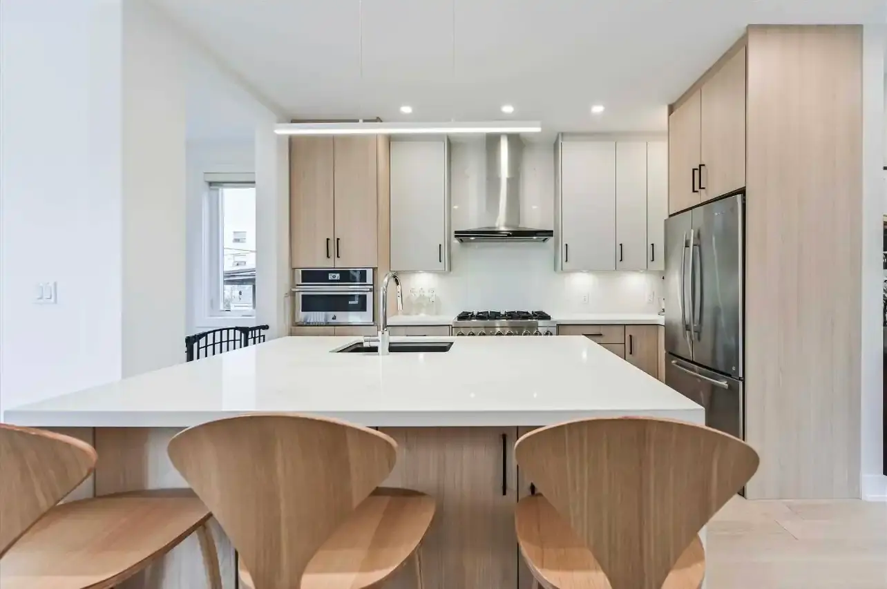 Kitchen pot lights and pendant lights Marrast installed in a custom home